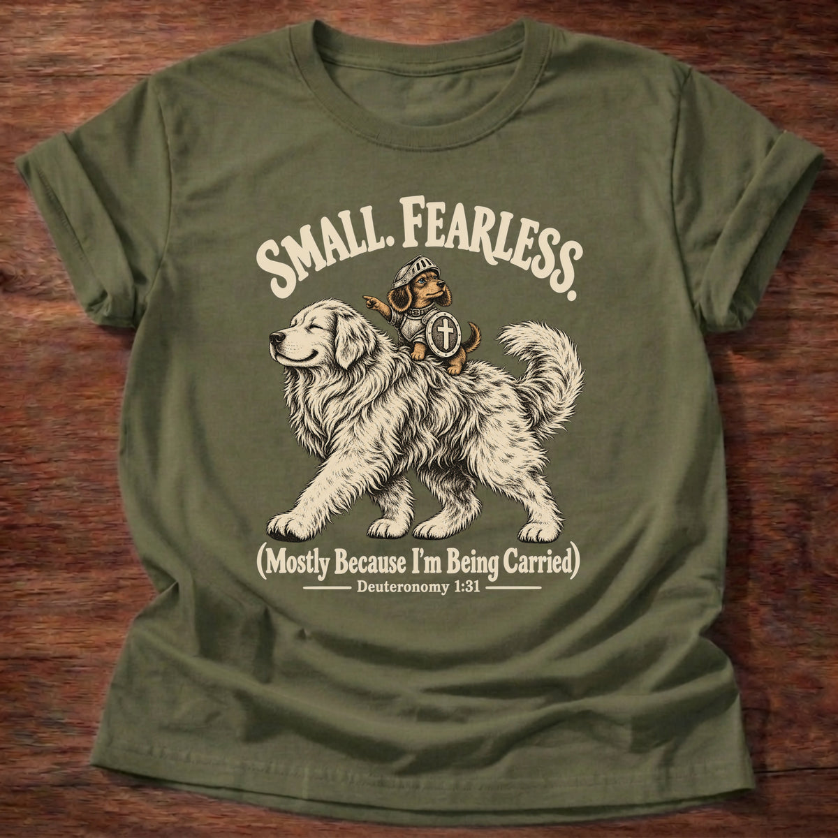 Military Green t-shirt printed with a tiny brave rider on a big fluffy dog graphic and “Small. Fearless. (Mostly because I'm being carried.)” Deuteronomy 1:31 Christian shirt