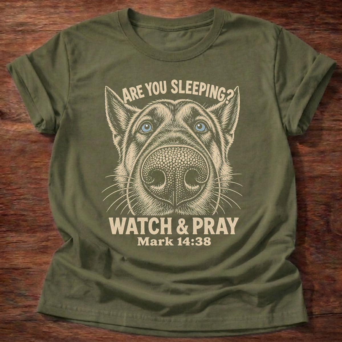 Military Green t-shirt printed with a close-up side-eyeing dog face graphic and “Are you sleeping? Watch & pray.” Mark 14:38 Christian shirt