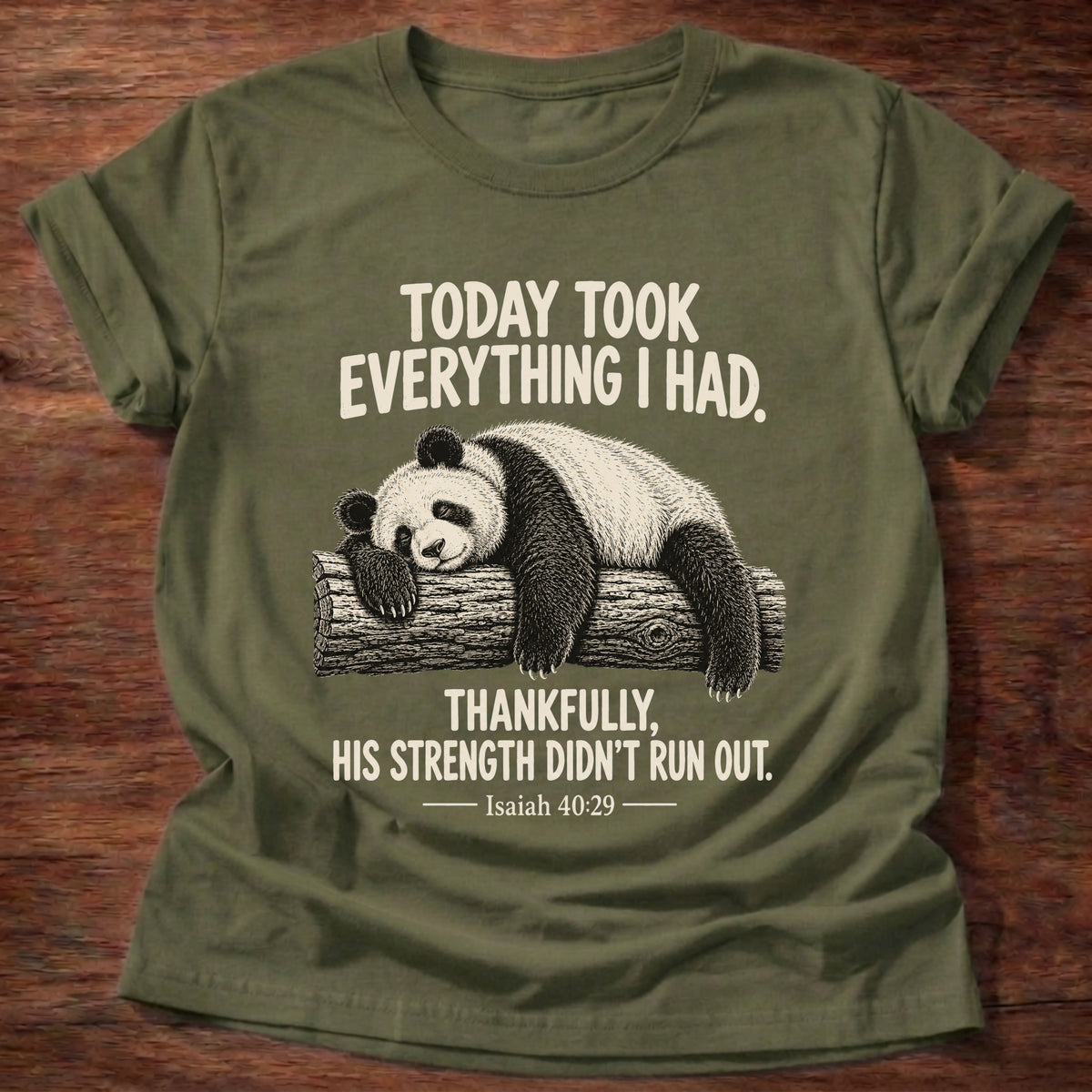 Military Green t-shirt printed with a panda sleeping draped over a log graphic and “Today took everything I had. Thankfully, His strength didn't run out.” Isaiah 40:29 faith based gift