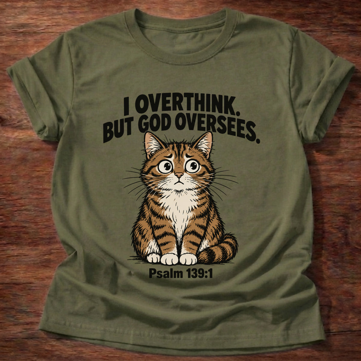 Military Green t-shirt printed with a cat graphic and 'I overthink. But God oversees.' Psalm 139:1 faith based gift