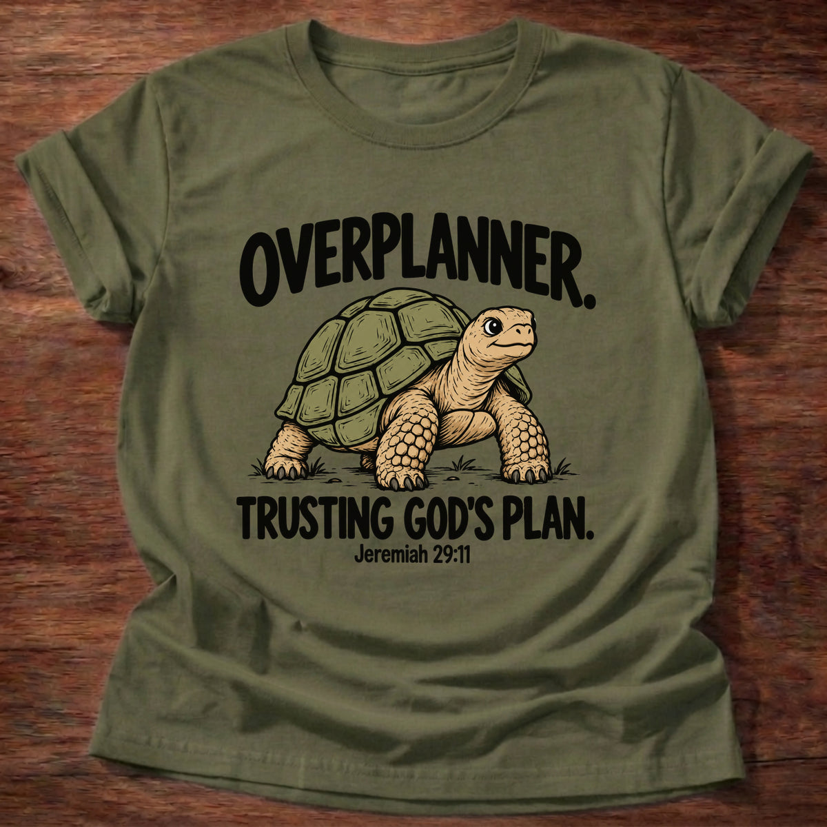 Military Green t-shirt printed with a turtle graphic and 'Overplanner. Trusting God's plan.' Jeremiah 29:11 faith based gift