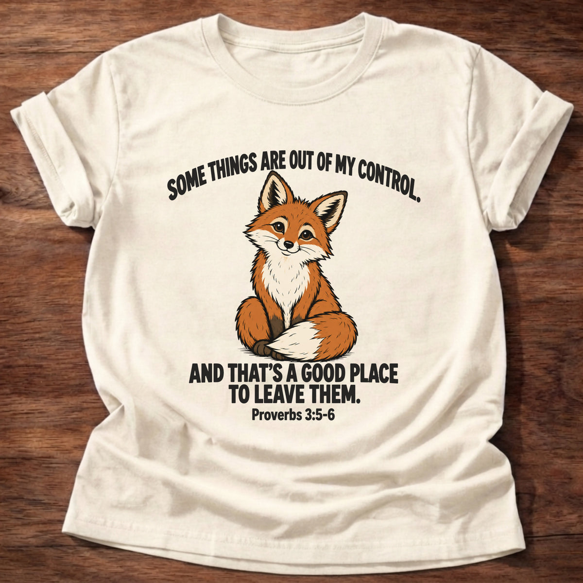 Natural t-shirt printed with a fox graphic and 'Some things are out of my control. And that's a good place to leave them.' Proverbs 3:5-6 faith based gift