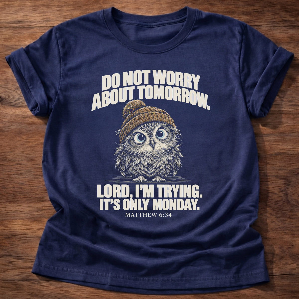 Only Monday T-Shirt in Navy featuring a wide-eyed owl in a knit beanie and Matthew 6:34 worry humor design