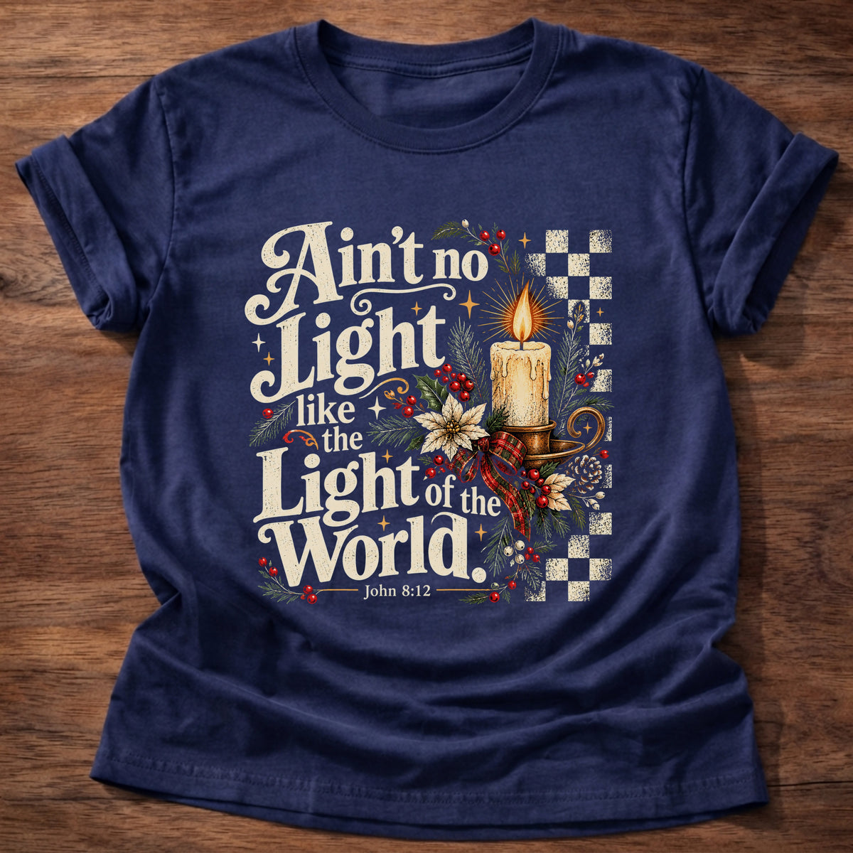 Navy t-shirt printed with a retro glowing candle with poinsettias and checkerboard graphic and “Ain't no light like the Light of the World.” John 8:12 Christian shirt