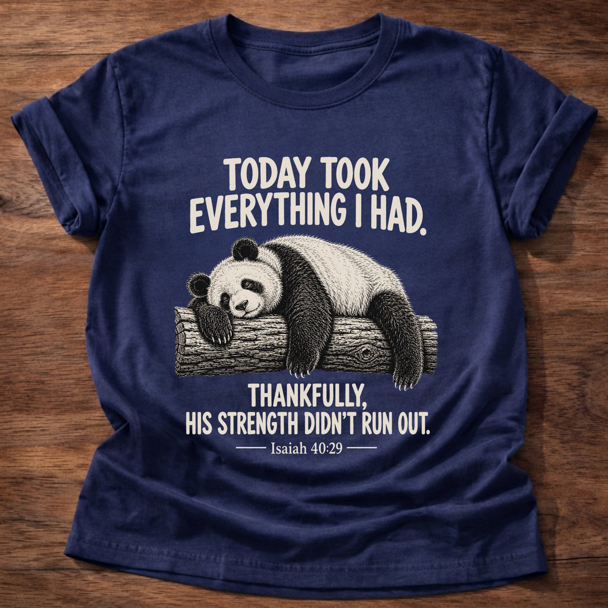 Navy t-shirt printed with a panda sleeping draped over a log graphic and “Today took everything I had. Thankfully, His strength didn't run out.” Isaiah 40:29 faith based gift