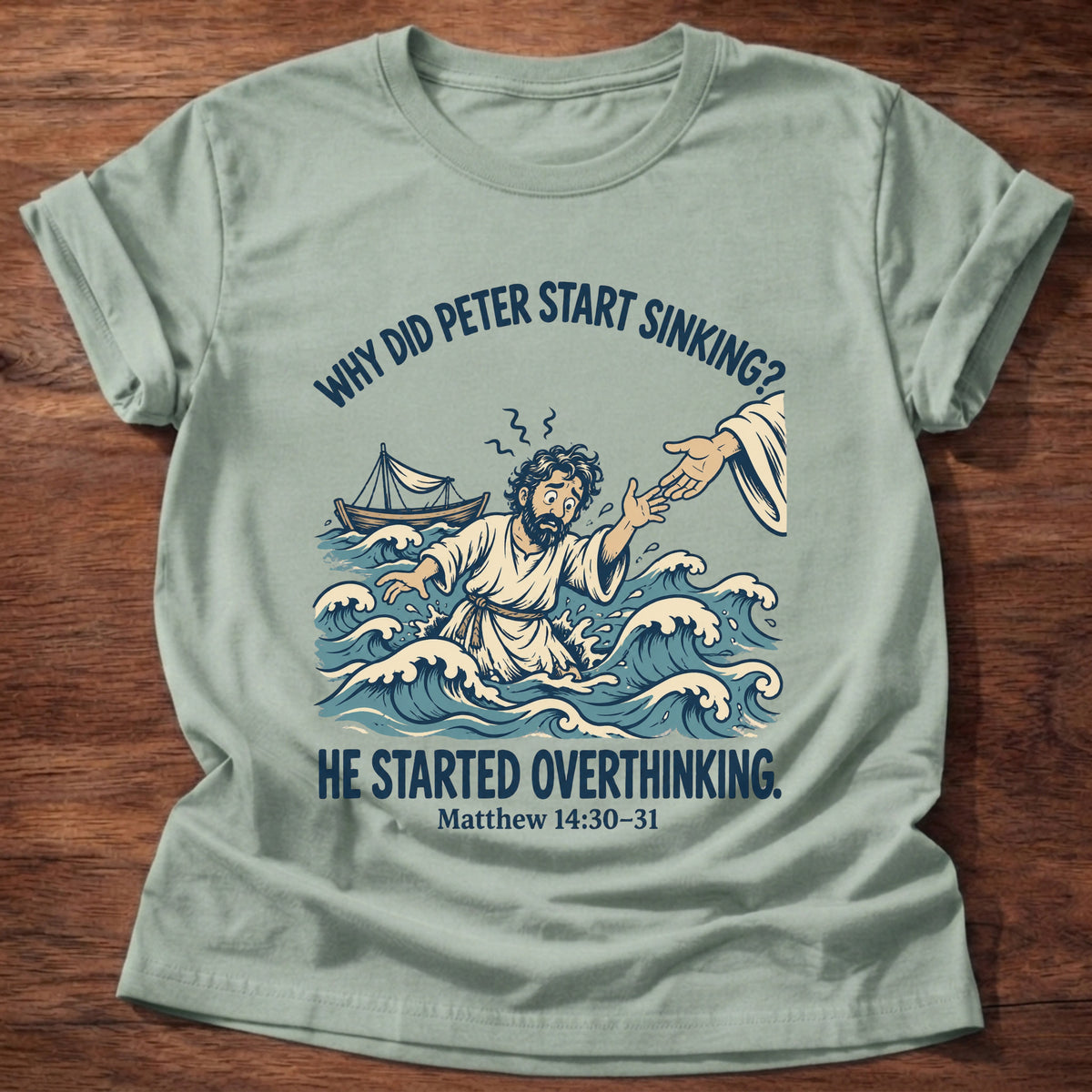 Sage t-shirt printed with a vintage illustration of Peter sinking in stormy waves as Jesus reaches out graphic and “Why did Peter start sinking? He started overthinking.” Matthew 14:30-31 Christian shirt