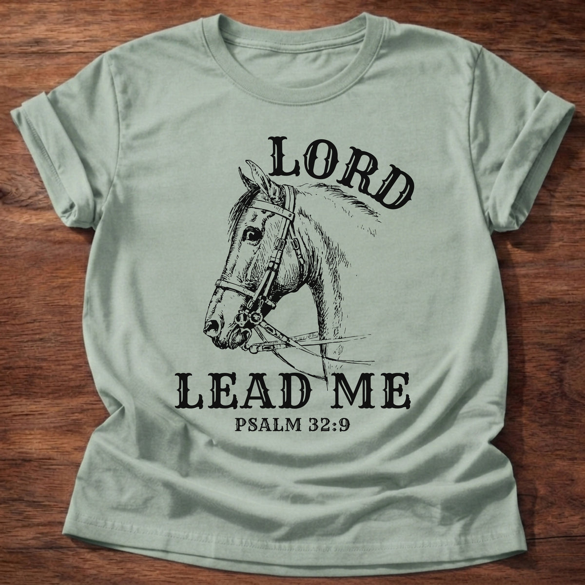 Sage t-shirt printed with a hand-sketched horse wearing a bridle and “Lord, Lead Me” Psalm 32:9 Christian shirt