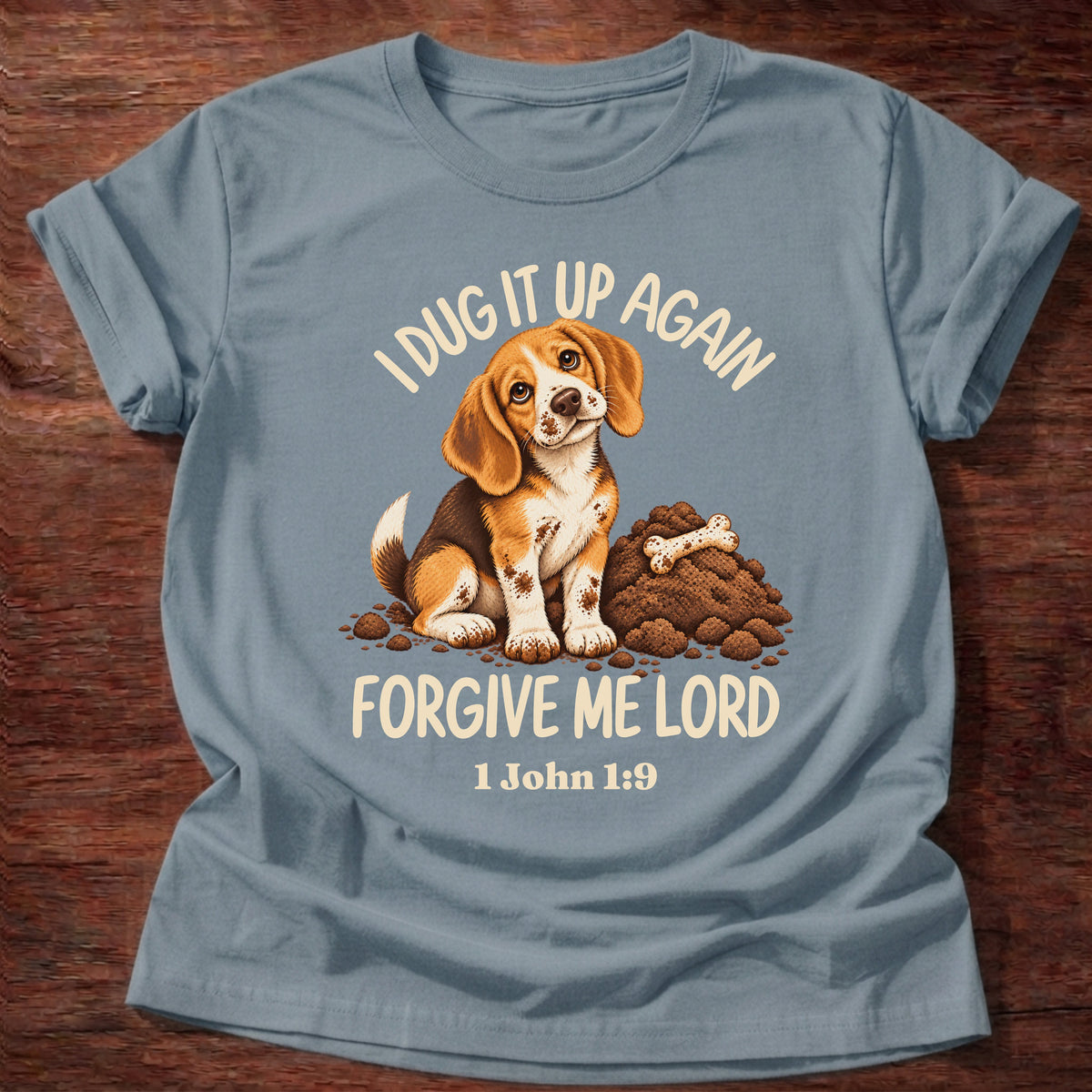 Stone Blue t-shirt printed with a sheepish beagle puppy beside a pile of dug-up dirt and a bone and “I dug it up again. Forgive me, Lord.” 1 John 1:9 Christian shirt