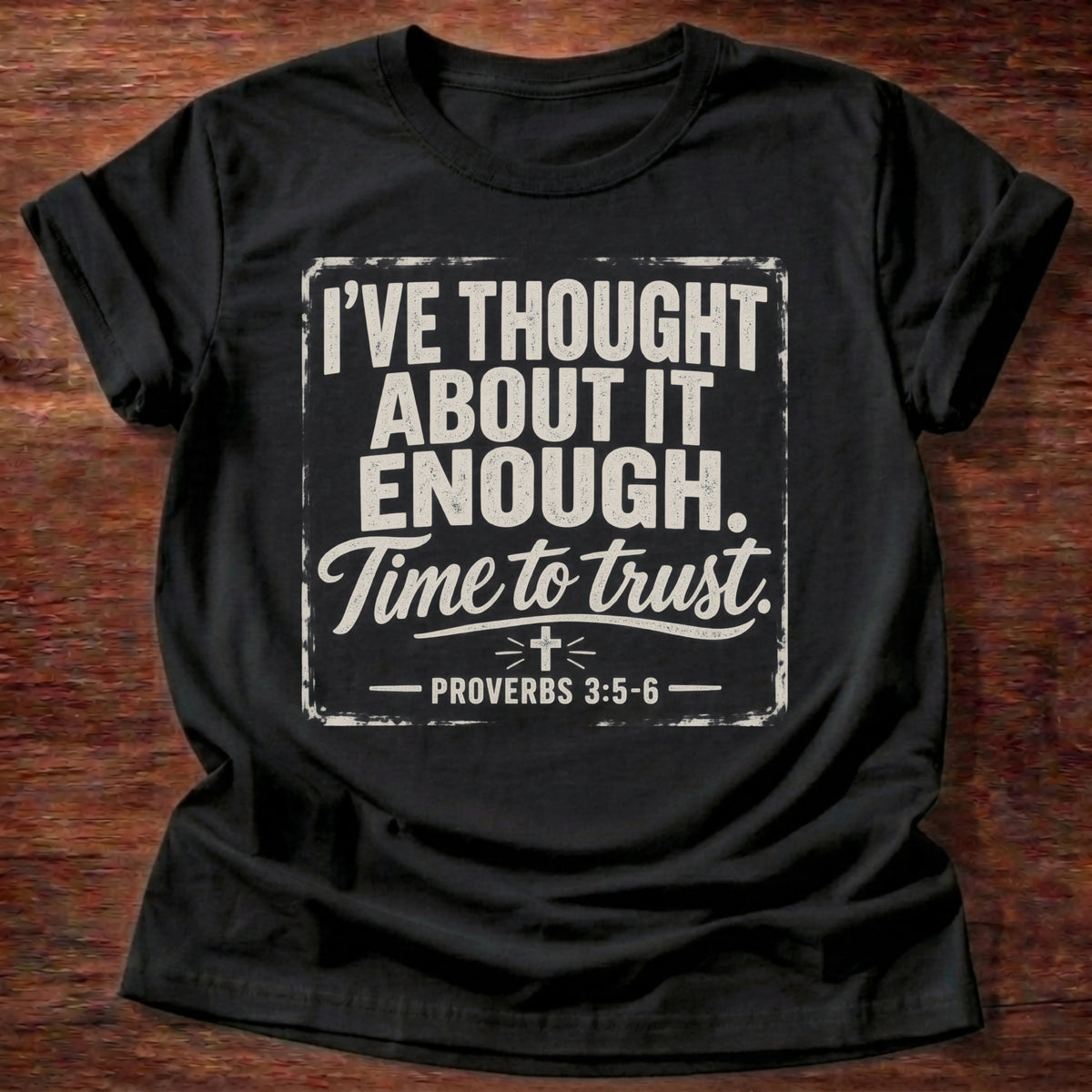 Black t-shirt with 'I've thought about it enough. Time to trust.' typography, a grounding Christian tee